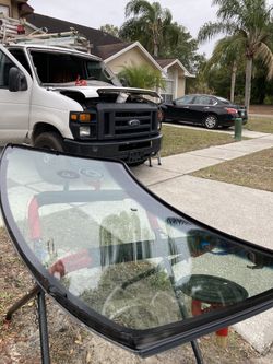 Replace the windshield Ford Econoline Van 2006-2008