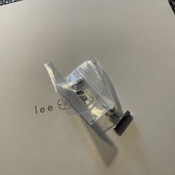 lee fiori bar stud earrings 10k white gold new, in package never worn.
