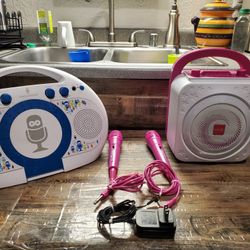 2  Karaoke machines + 2  Microphones + 1 Power Cord 