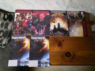 Transformers Vault book and IDW Comic Books