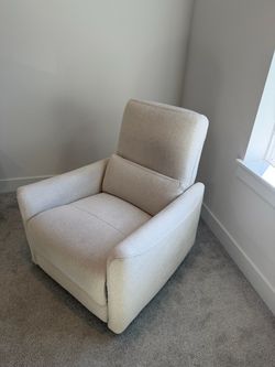 Cream Upholstered Swivel Glider Chair