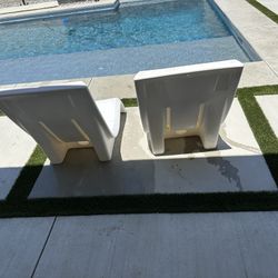 Two White In Pool Loungers 