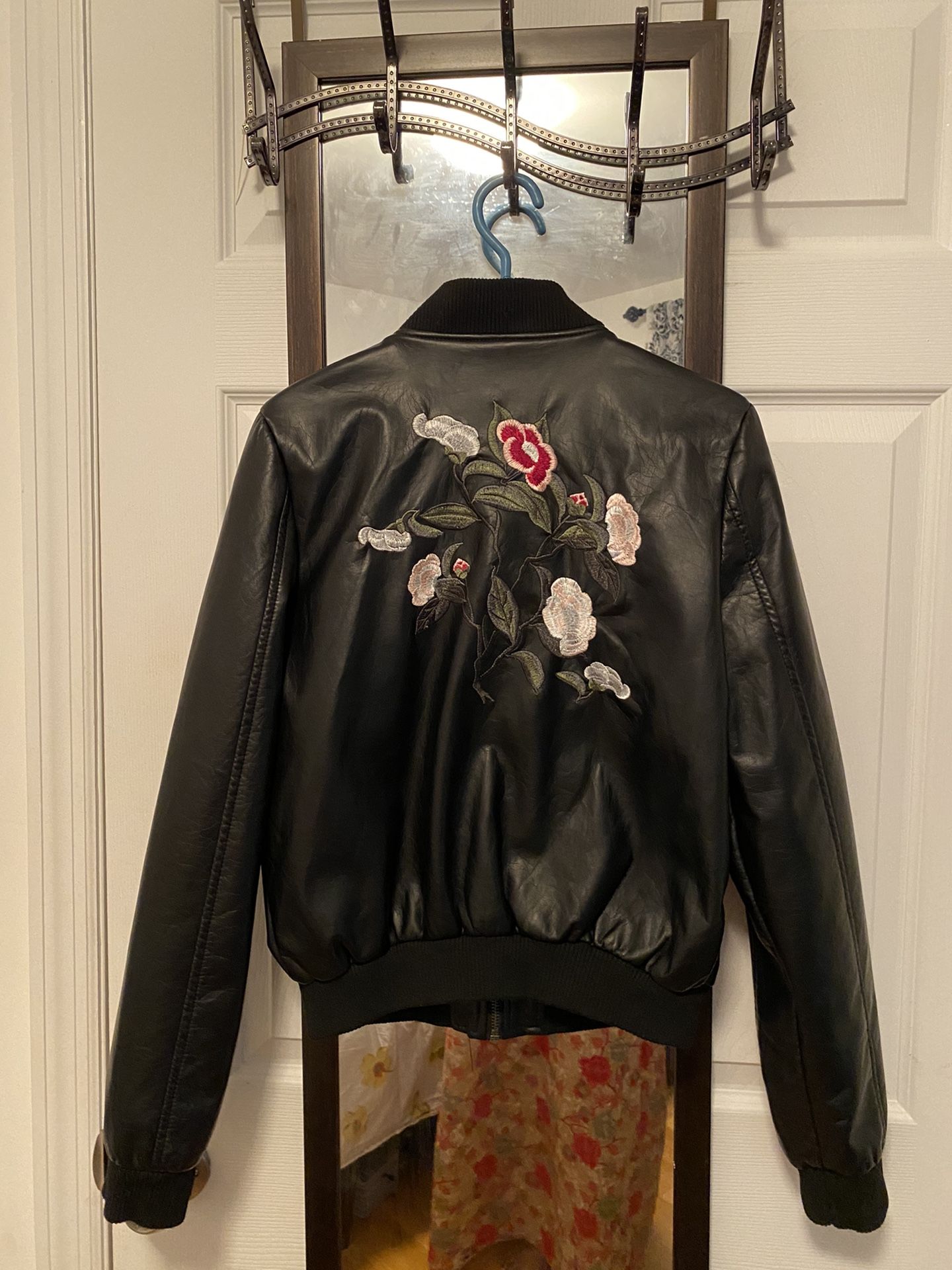 Beautiful black leather bomber jacket in size small