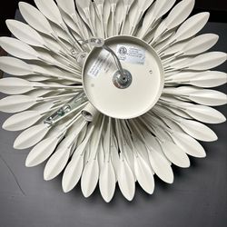 Crystorama  White Flower-shaped calling light.