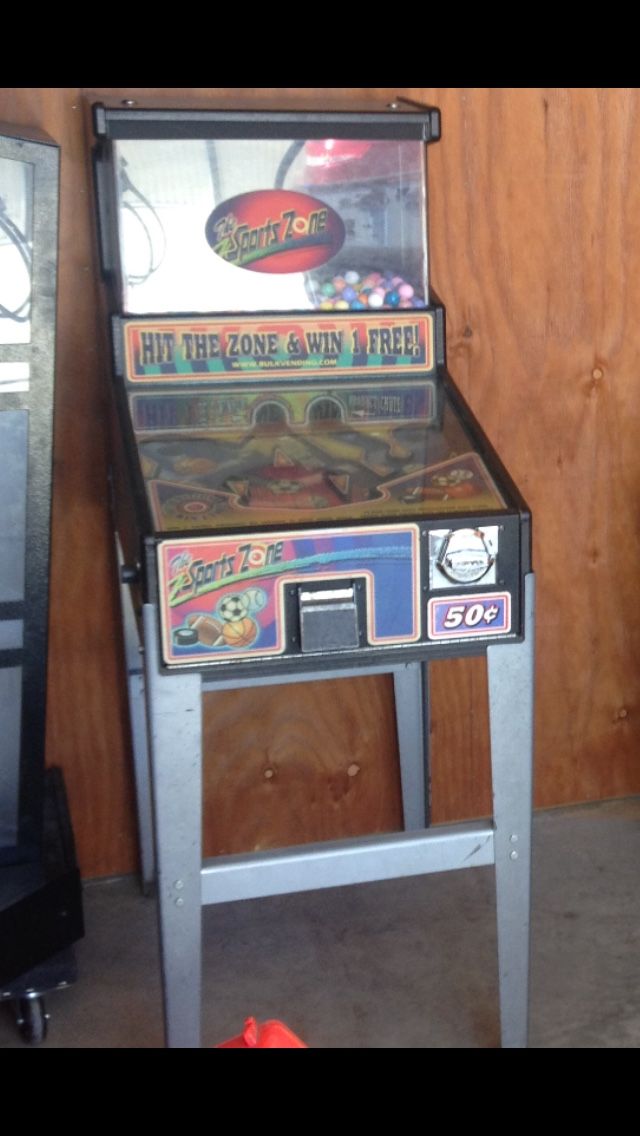 Coin operated pinball for ball or candy vend arcade