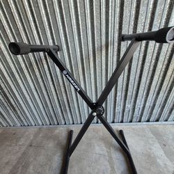 KEYBOARD STAND/ ADJYSTS TO DIFFERENT HEIGHTS & FOLDS UP/ NOT FREE GIVE OFFER