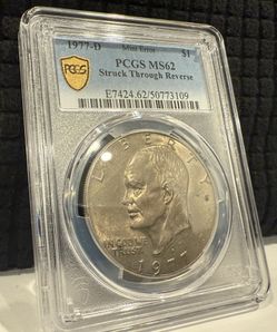 1977 D Eisenhower Dollar Struck Through Reverse MINT ERROR Gold Shield PCGS 