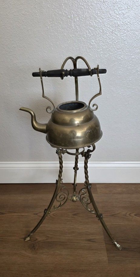RARE Antique Victorian Brass Spirit Kettle & Stand
Antique brass kettle on a stand exudes vintage charm and elegance. Perfect for serving tea or coff