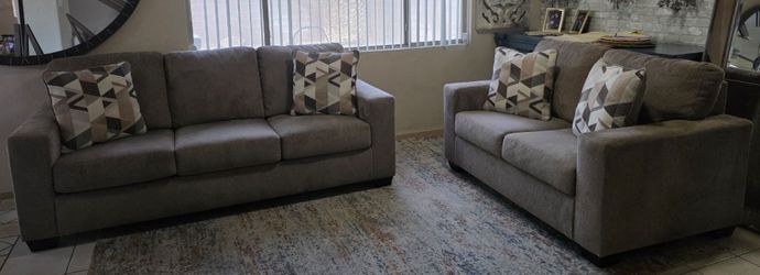 Beautiful sofa and loveseat from Ashley furniture... 👑  🧸