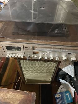 Vintage record player Cassey player with vintage pioneer speakers .
