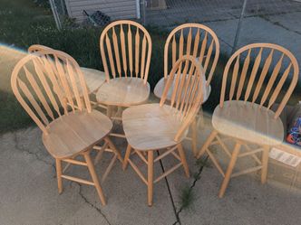 6 solid wood swivel chairs $350