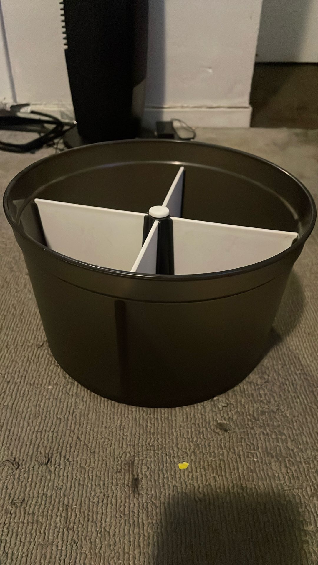 Rotating storage bin