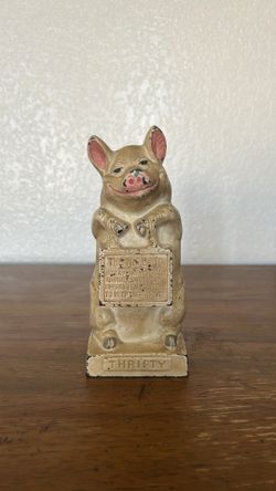 The Wise Pig cast iron Piggy Bank