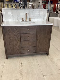 48” graycn James Martin vanity in walnut color new with Quartz top sink attached Softclose drawers doors ready for pick up today