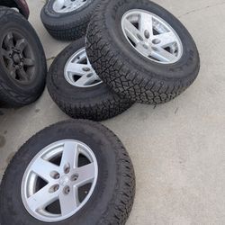 Set Of 16 Inch Tires And Jeep Wheels