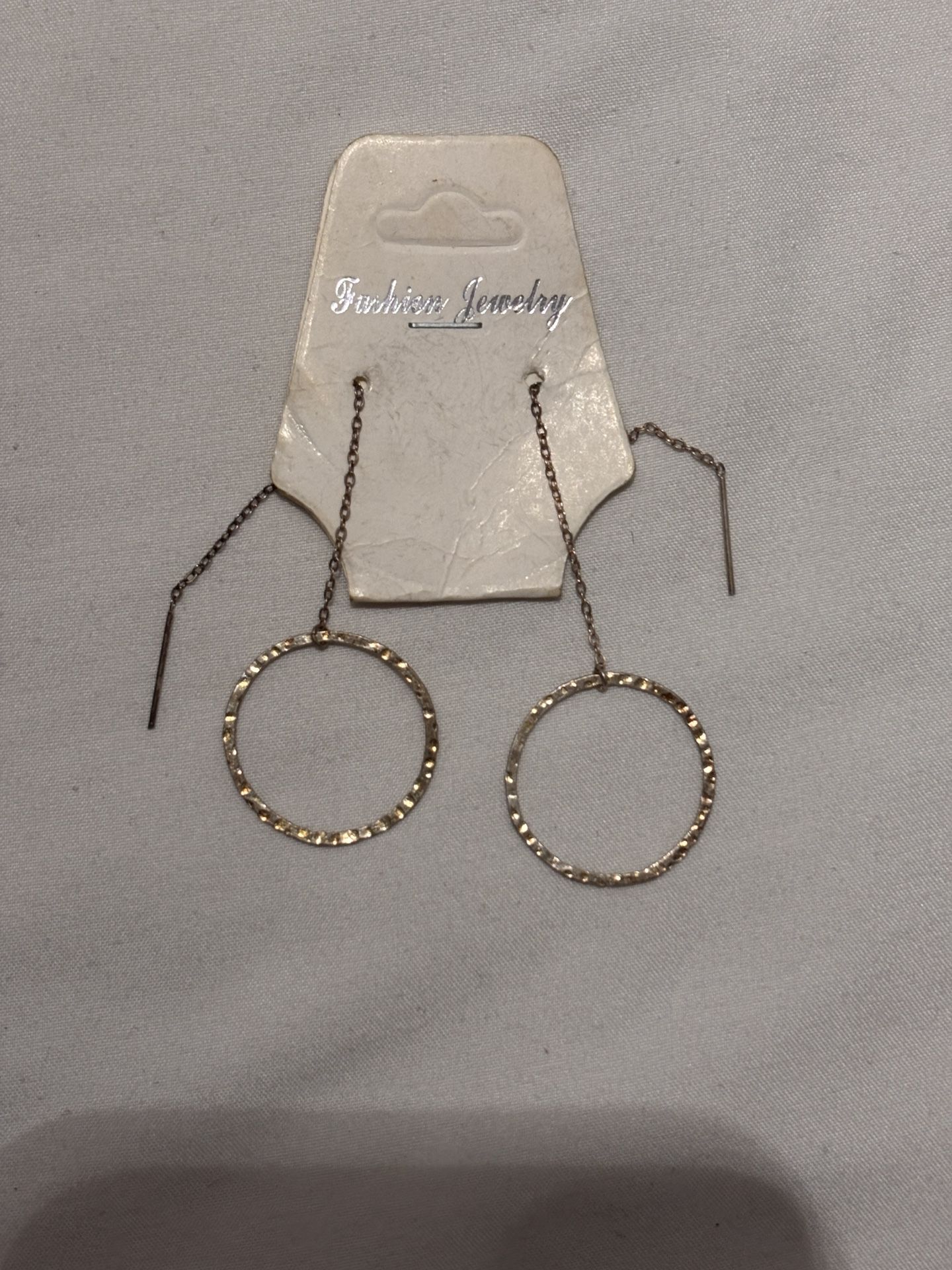 Gold tone hammered circle drop earrings