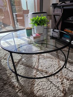 Round glass coffee table