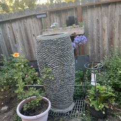 stacked pebble water fountain 