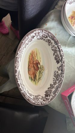 Spode Woodland 12-inch oval baker featuring a rustic brown floral border and a rabbit