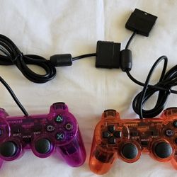 
2x Transparent Wired Controllers for PlayStation 2 (PS2) – Purple & Orange