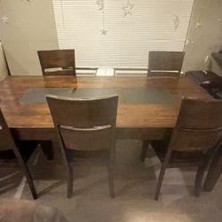 Wooden table with 6 chairs