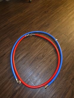 Washer water hoses hot and cold.