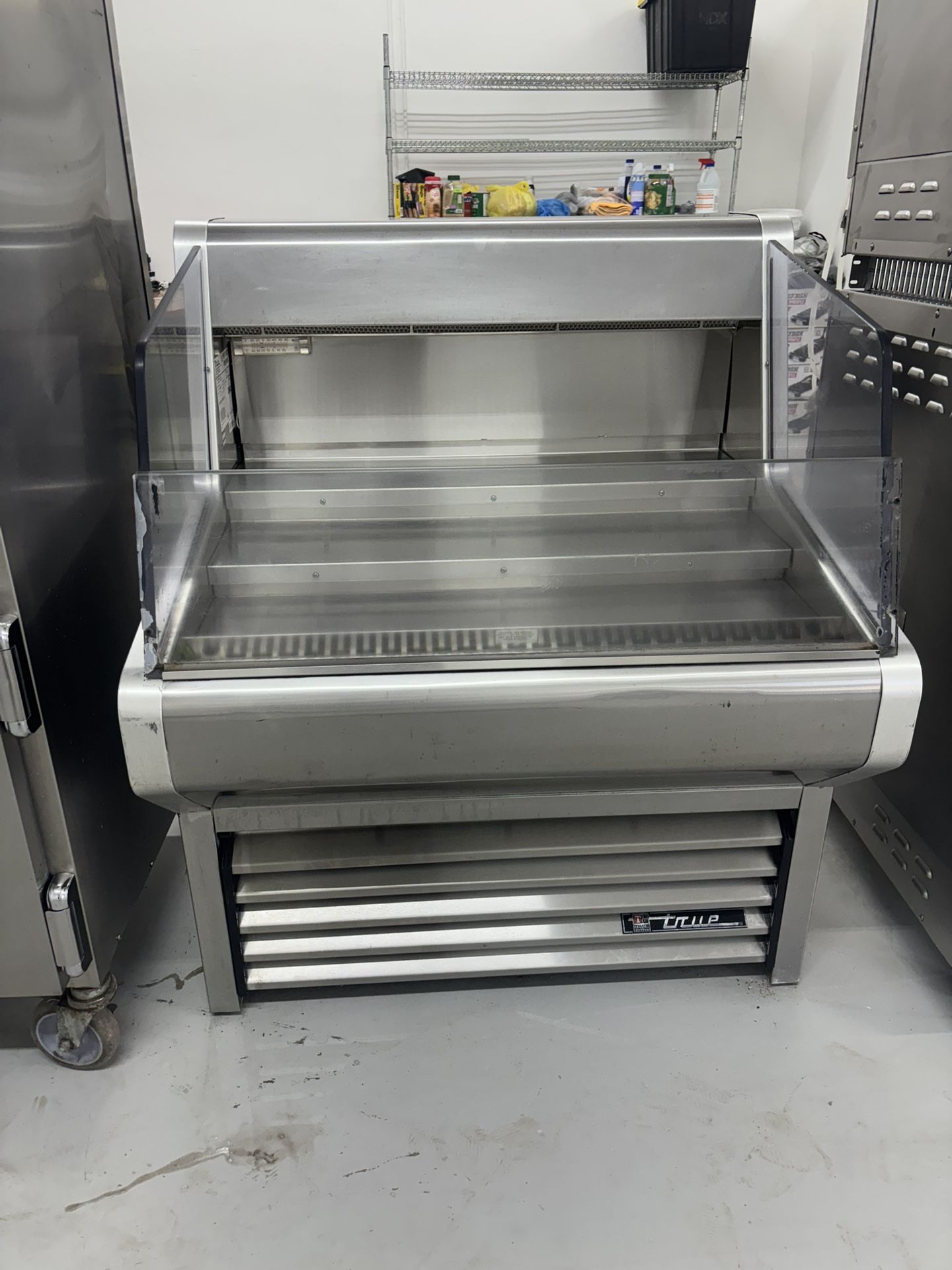A horizontal open cooler for sale, illustrating practical storage solutions for seasonal produce.