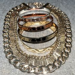 A Necklace And Love Bracelets 