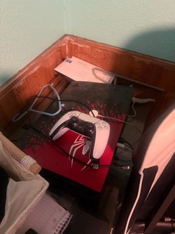 Ps5 with two controllers and gaming chair