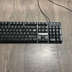 Gaming keyboard and mouse both light up