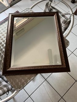Very nice, high-quality mirror; it measures 25 x 21 inches.