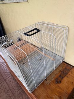 Carry on bird or small pet crate.
