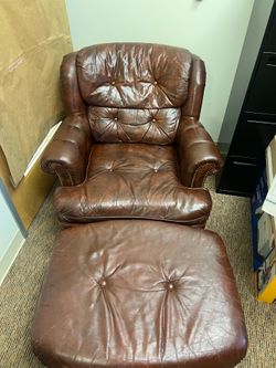 Brown genuine leather chair and ottoman