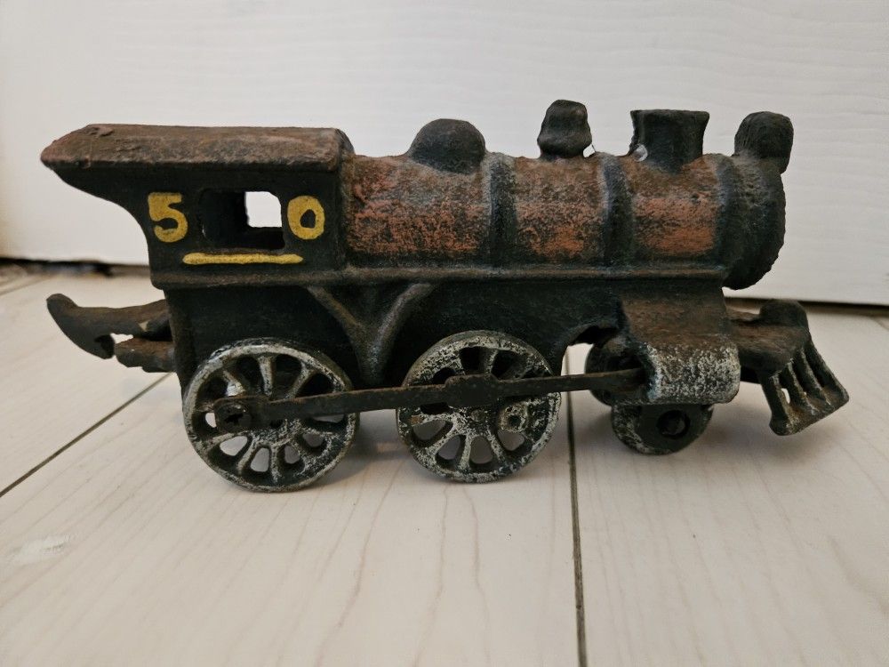 Vintage Cast Iron Toy Train Engine – “50” Painted Number – Decorative Collectible

3. Description: