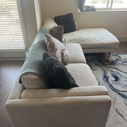 Beige Sectional Couch With Throw Pillows