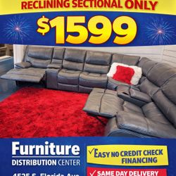 New year sale. Madrid gray leather reclining sectional now $1599. Easy finance option. Same day delivery.
