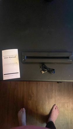 Ink-less portable printer