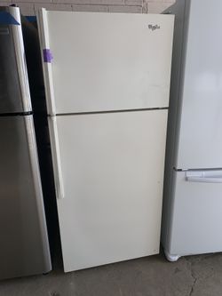 WHIRLPOOL beige top freezer refrigerator in excellent conditions
