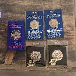 5 Walt Disney World Collector’s Medallions