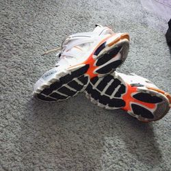 Balenciaga Track sneakers in white and orange leather and mesh. 