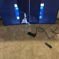 Fairly used samsung 65inch curved QLED with a cracked screen during move. Retail price $2500