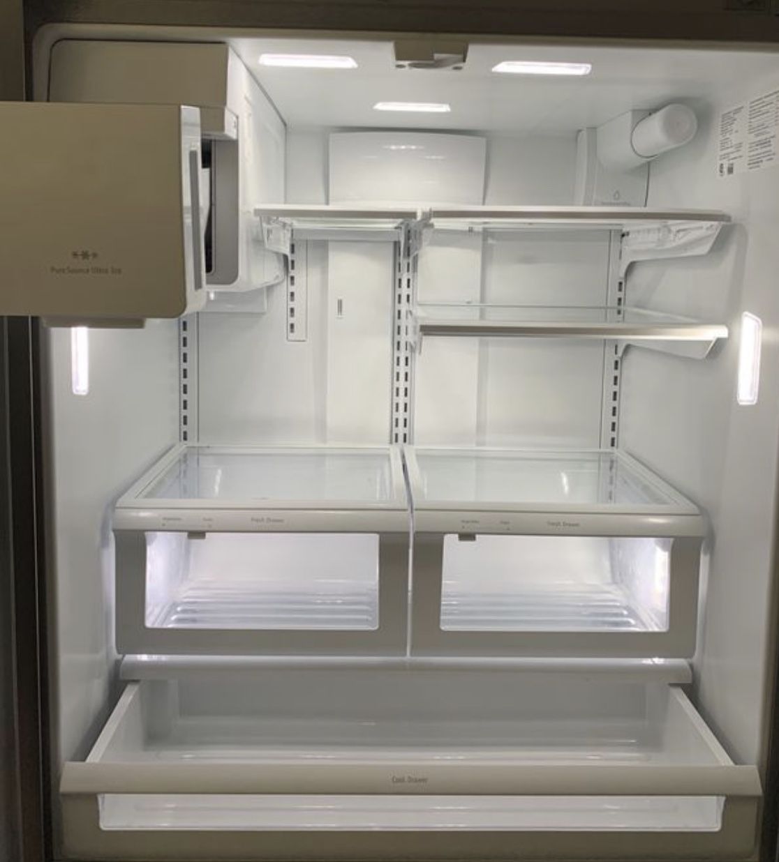 Frigidaire fridge/freezer. Must pick up. Ice maker makes ice but does