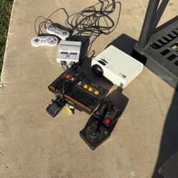 Super Nintendo, Atari, Projector