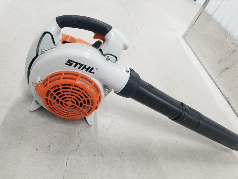 Stihl blower And Black and Decker hedge trimmer