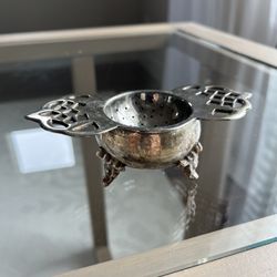 vintage silver-plated tea strainer