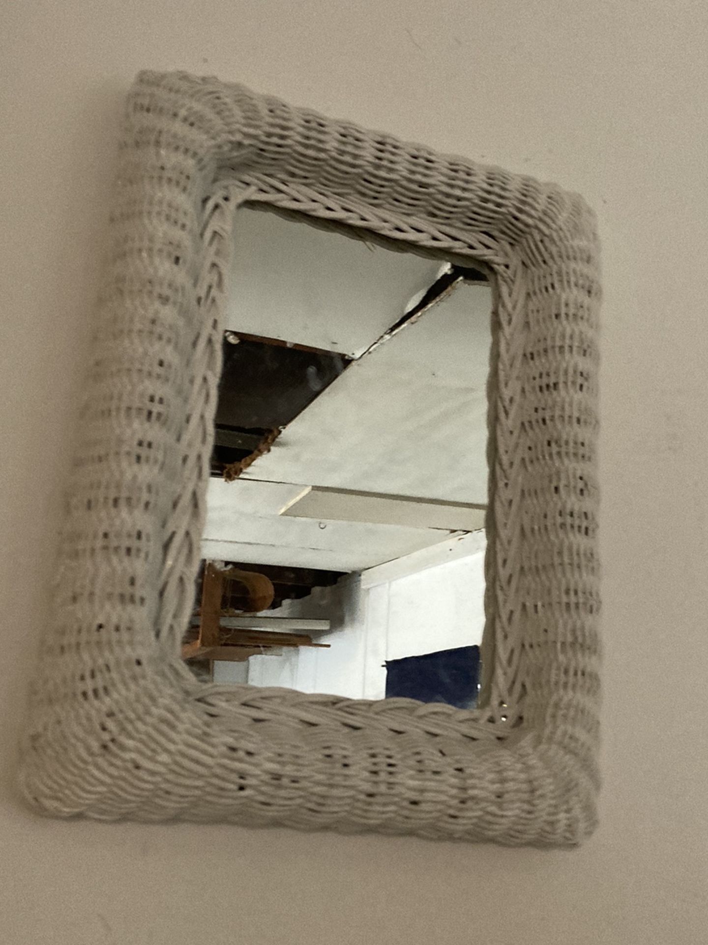 White vintage wicker mirror
