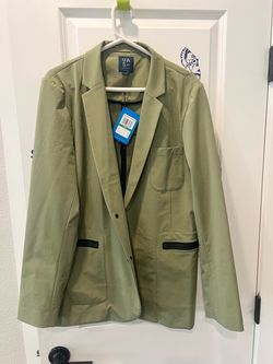Under Armour men's blazer sport coat in green, made of spandex, polyamide, and cotton materials.