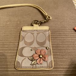 Coach Lanyard Floral Appliqué With Strap. Preowned in good condition