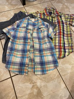 Lot of 4 short sleeve shirts ( Carter’s, Tommy, Ralph Lauren )