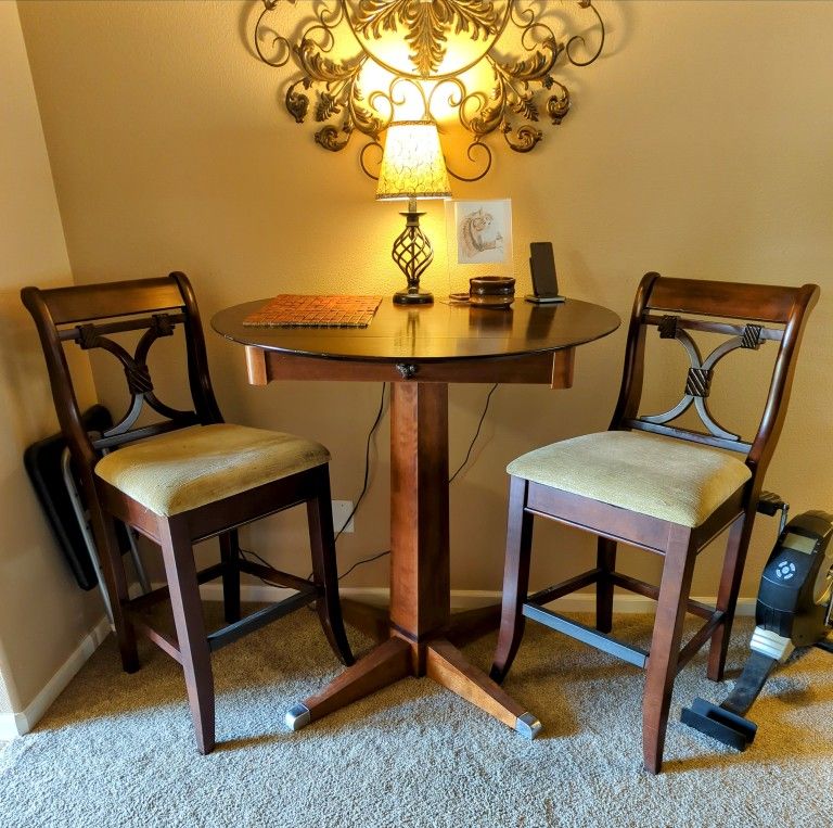 Beautiful Bar Height Table And Two Chairs